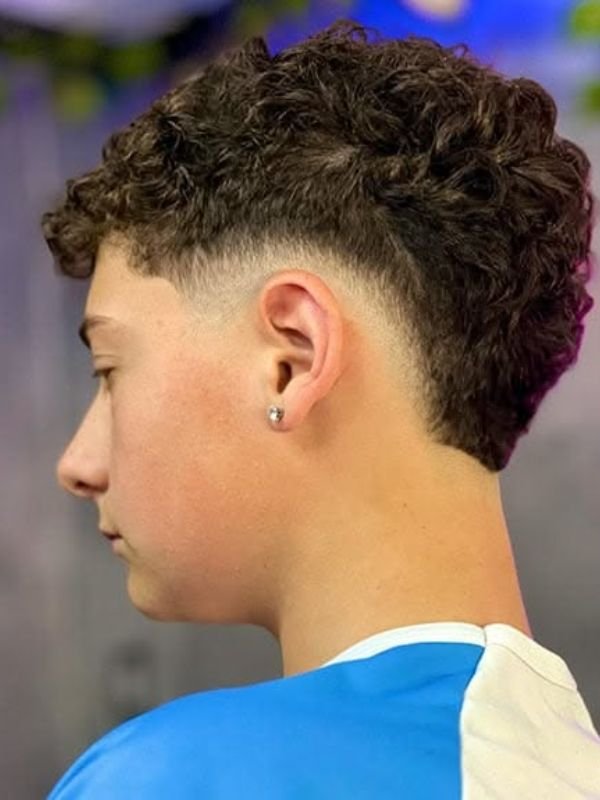 Burst Fade Mohawk Curly Hair